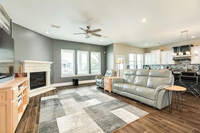 living room with ceiling fan