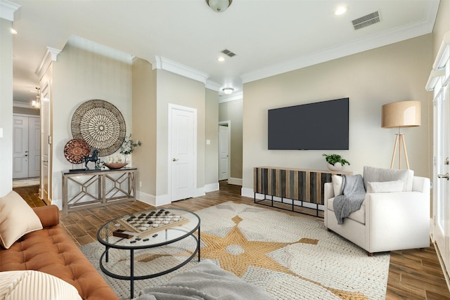 living room with ornamental molding