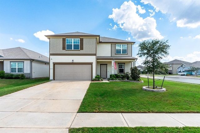 view of front of property with concrete driveway, an attached garage, and a front lawn