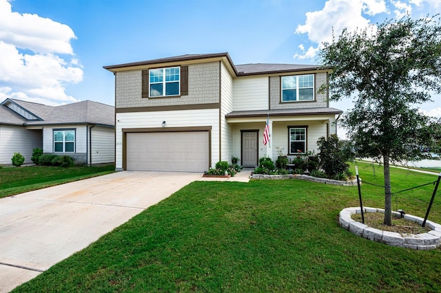 view of front of house with a garage, a front yard, and concrete driveway