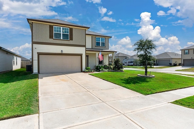 view of front of home featuring a garage, a residential view, a front lawn, and concrete driveway