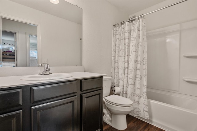 full bathroom featuring vanity, shower / bath combination with curtain, wood finished floors, and toilet