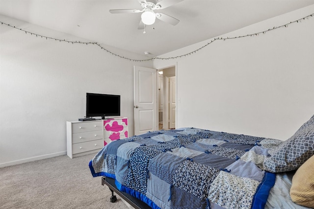 bedroom with carpet floors, a ceiling fan, and baseboards