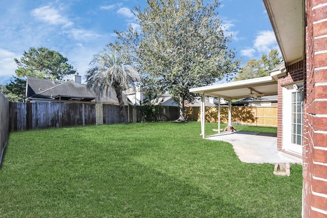 view of yard with a patio area