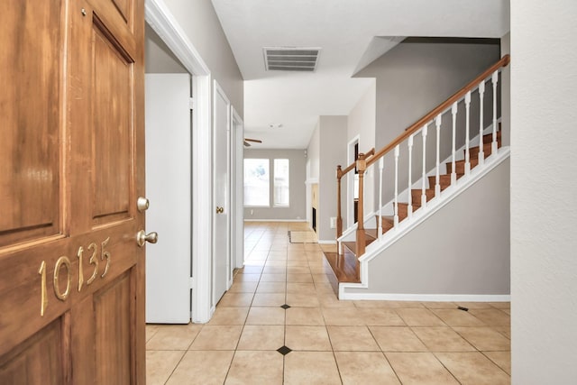 view of tiled foyer entrance