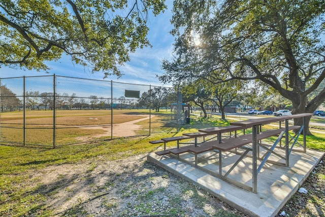 view of home's community with a yard