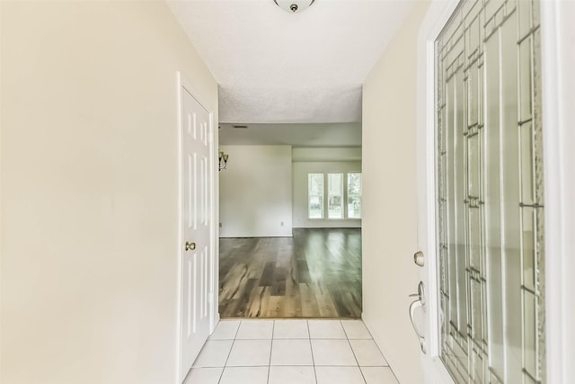 16002 Maple Acres Ct, Houston, TX 77095 - hallway with tile patterned flooring