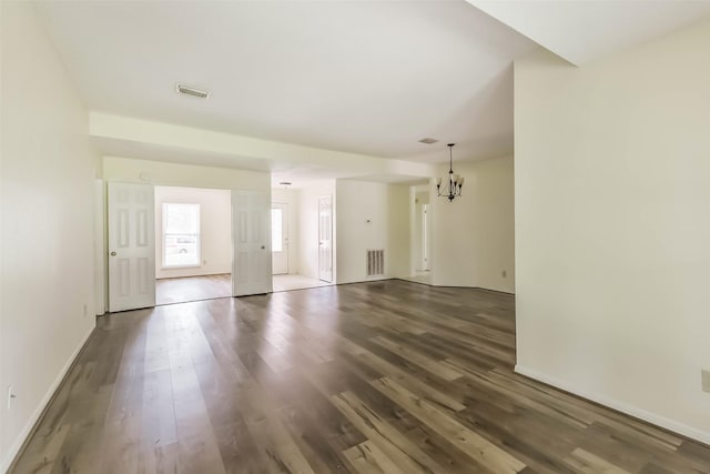 16002 Maple Acres Ct, Houston, TX 77095 - unfurnished living room featuring wood finished floors and a chandelier