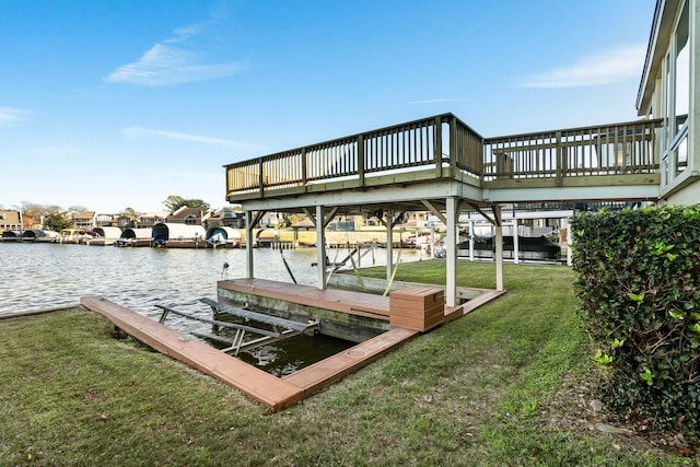 view of dock featuring a yard and a water view