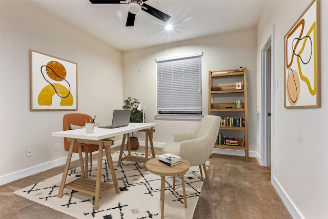 home office featuring carpet flooring and ceiling fan