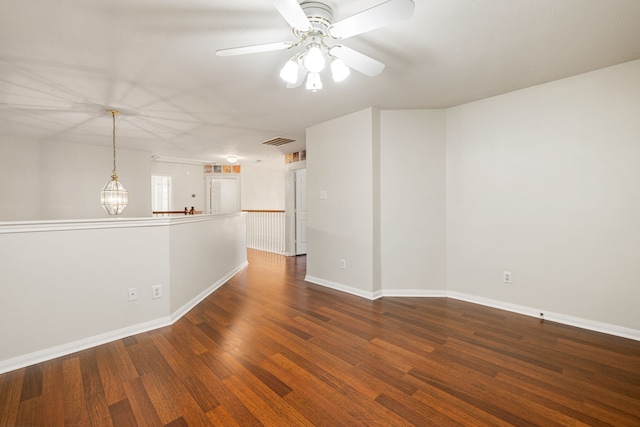 spare room featuring ceiling fan and hardwood / wood-style floors