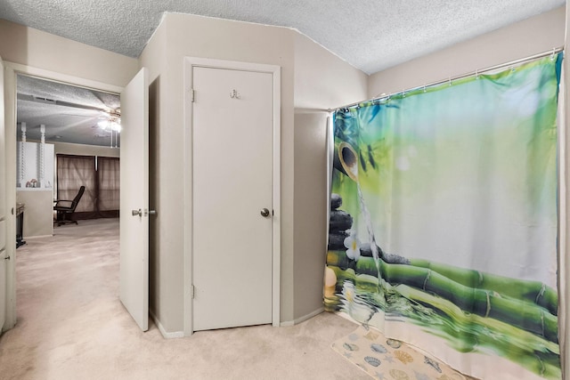 bathroom featuring a textured ceiling