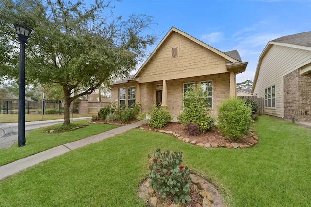 view of front of property with a front lawn