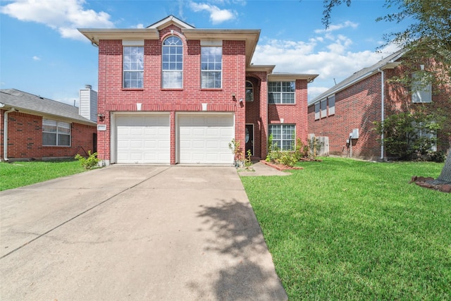 view of front of property featuring a front lawn and a garage