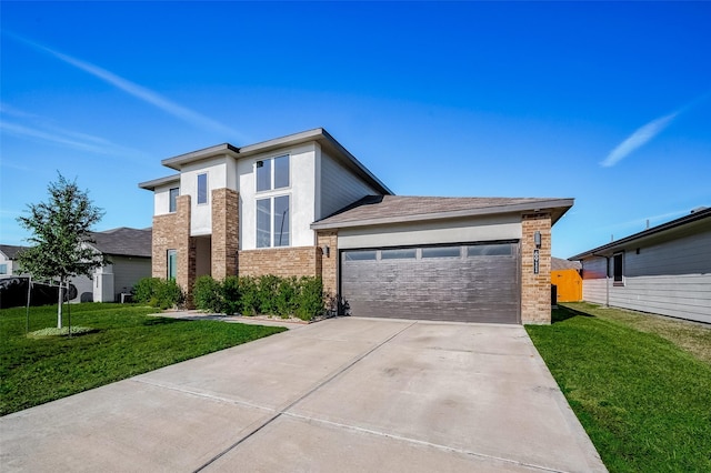 view of front facade with a front lawn and a garage