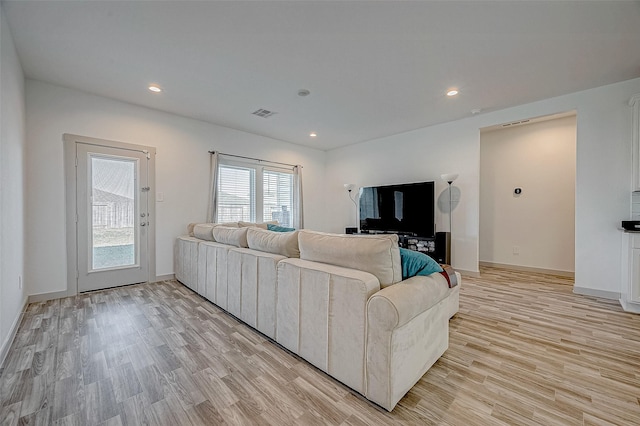 living room featuring light wood-type flooring