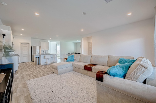 living room featuring light wood-type flooring