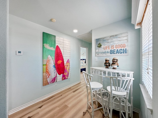 dining room with hardwood / wood-style flooring