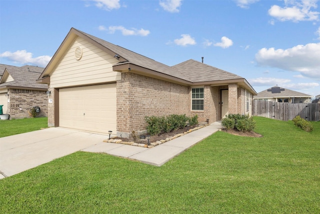 ranch-style house with driveway, an attached garage, fence, a front lawn, and brick siding