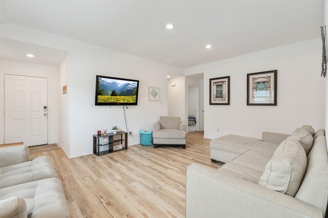 living room with light hardwood / wood-style flooring