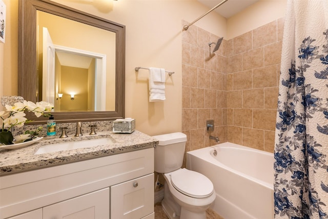 full bathroom featuring toilet, shower / tub combo, and vanity