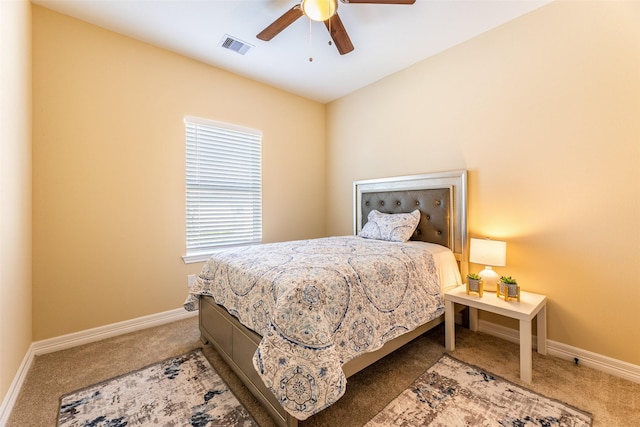 bedroom with ceiling fan and carpet floors