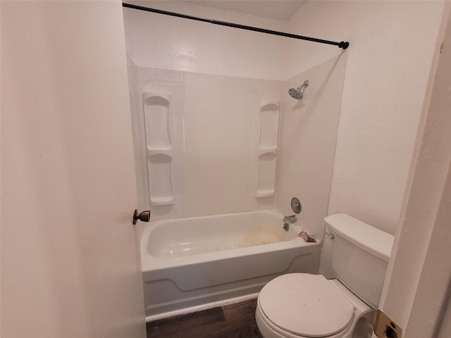 full bathroom featuring toilet, shower / tub combination, and wood finished floors