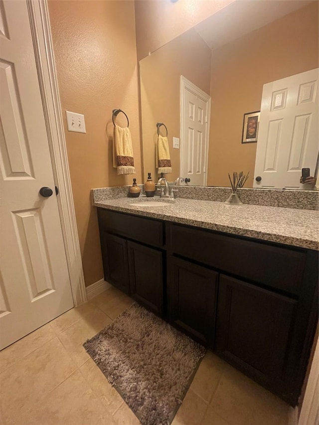 bathroom featuring vanity and tile patterned floors