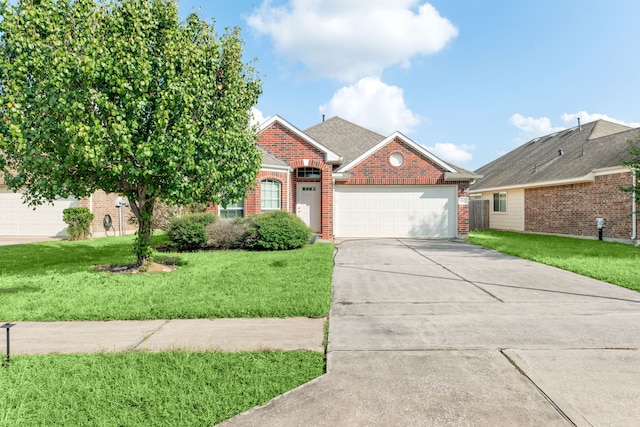 view of front of house featuring a front lawn and a garage