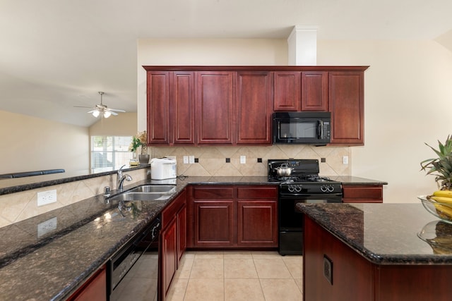 kitchen with sink, lofted ceiling, light tile patterned flooring, decorative backsplash, and black appliances