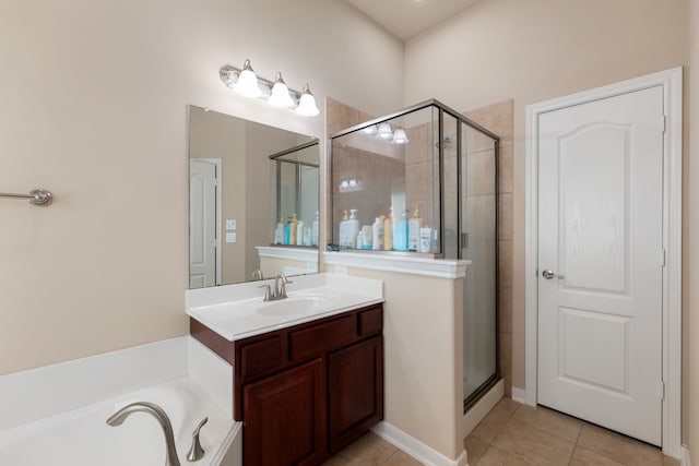 bathroom with tile patterned flooring, plus walk in shower, and vanity