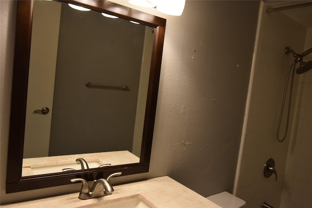 full bathroom with toilet, vanity, and tub / shower combination