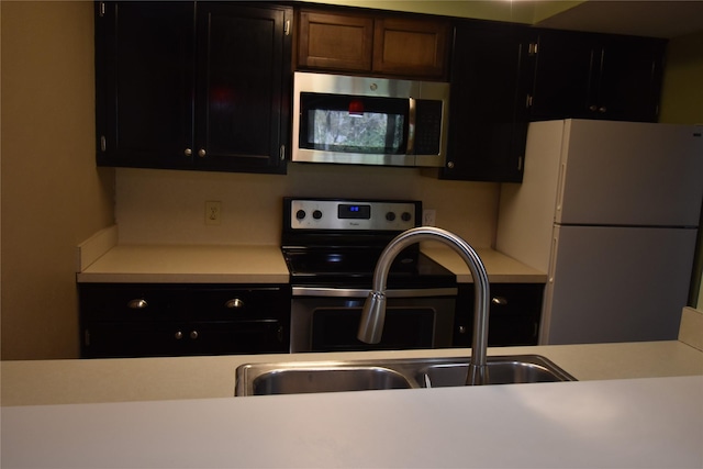 kitchen with stainless steel appliances and sink