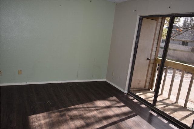 empty room featuring hardwood / wood-style flooring