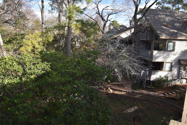 view of side of property featuring a balcony