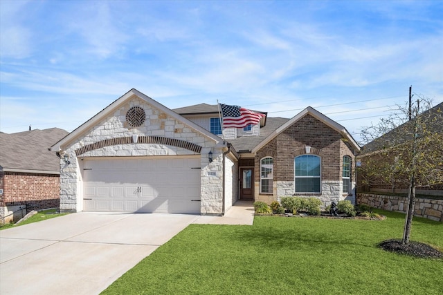 view of front of house featuring a front yard and a garage