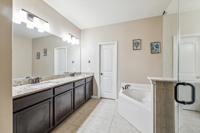 bathroom with tile patterned floors, plus walk in shower, and vanity