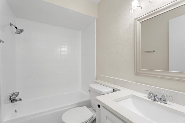 full bathroom with tiled shower / bath combo, vanity, and toilet