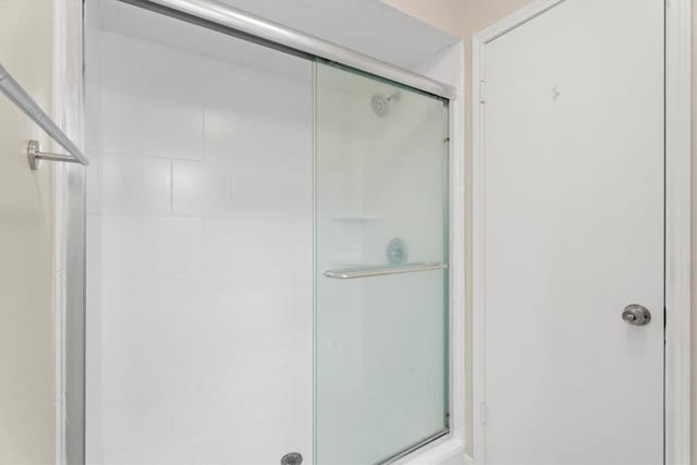 bathroom featuring walk in shower