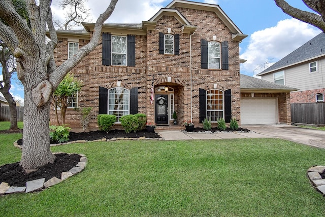 view of front facade featuring a front lawn and a garage