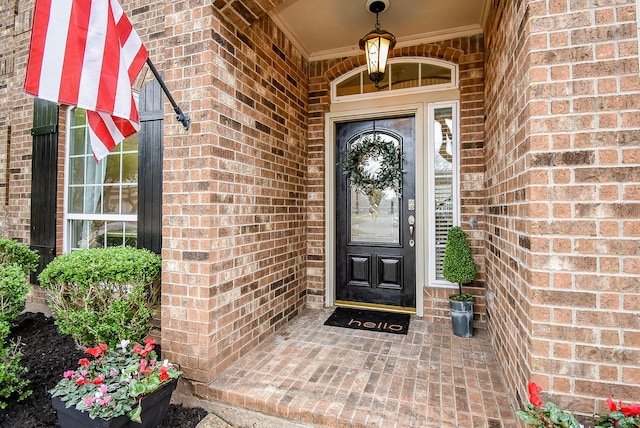 entrance to property with brick siding