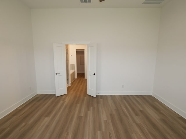 21734 Persian Lake Dr, Cypress, TX 77433 - empty room with baseboards and wood finished floors