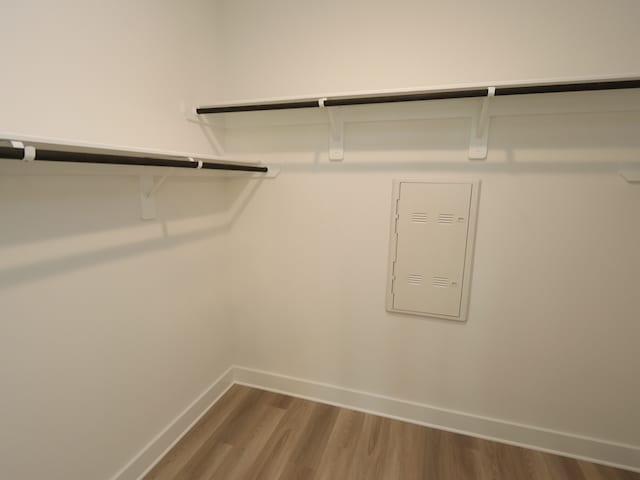 21734 Persian Lake Dr, Cypress, TX 77433 - spacious closet featuring wood finished floors