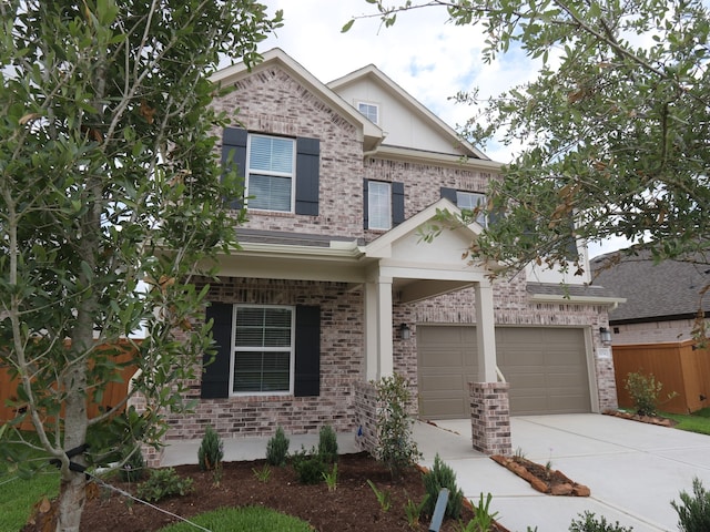 21734 Persian Lake Dr, Cypress, TX 77433 - view of front of property featuring driveway, brick siding, and an attached garage