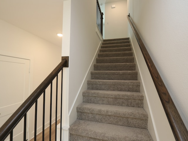 21734 Persian Lake Dr, Cypress, TX 77433 - staircase featuring recessed lighting