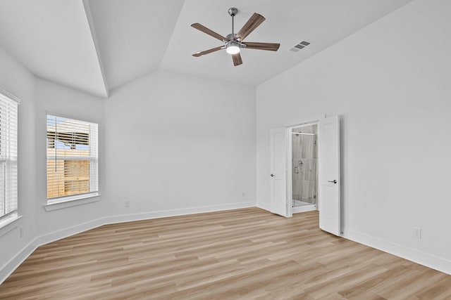 21734 Persian Lake Dr, Cypress, TX 77433 - unfurnished room with vaulted ceiling, ceiling fan, light wood finished floors, and baseboards