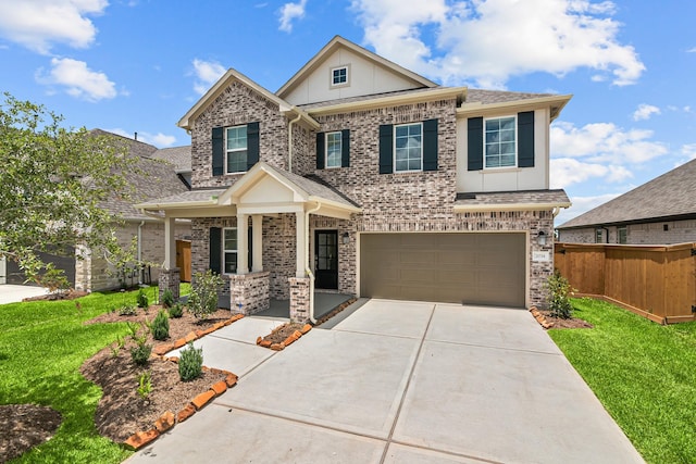 21734 Persian Lake Dr, Cypress, TX 77433 - craftsman-style home featuring a garage, concrete driveway, brick siding, covered porch, and a shingled roof