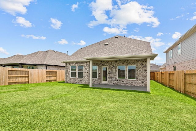21734 Persian Lake Dr, Cypress, TX 77433 - rear view of property with a shingled roof, a patio area, and brick siding