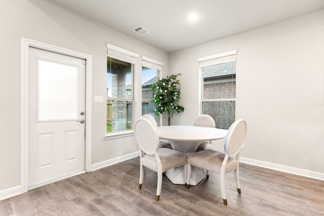 dining room with light hardwood / wood-style flooring