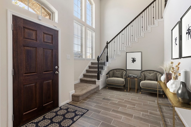 entryway with a high ceiling